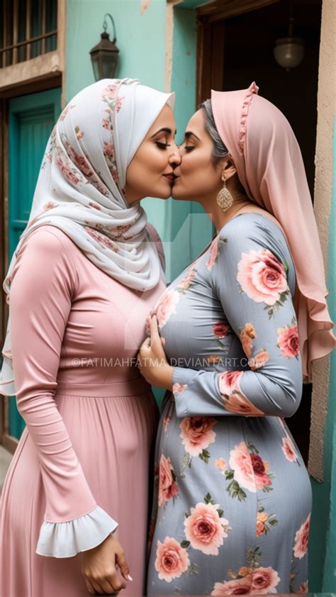 hijab lesbian|Beautiful lesbian muslim woman in hijab kissing her girlfriend。